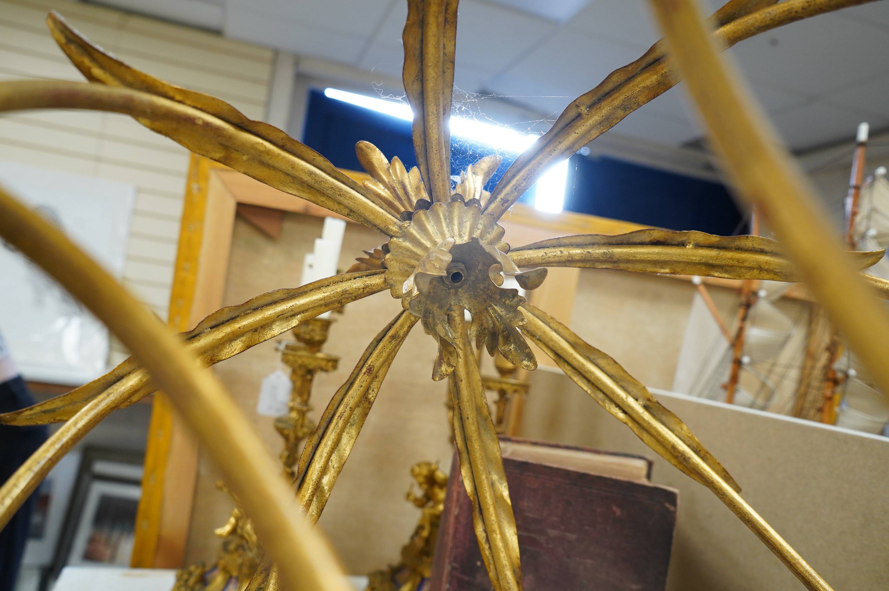 A gilt metal eight light basket chandelier, 86cm